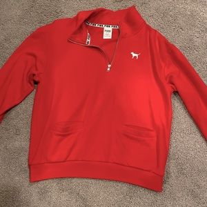 PINK half zip with front pockets and super cute arm details!!